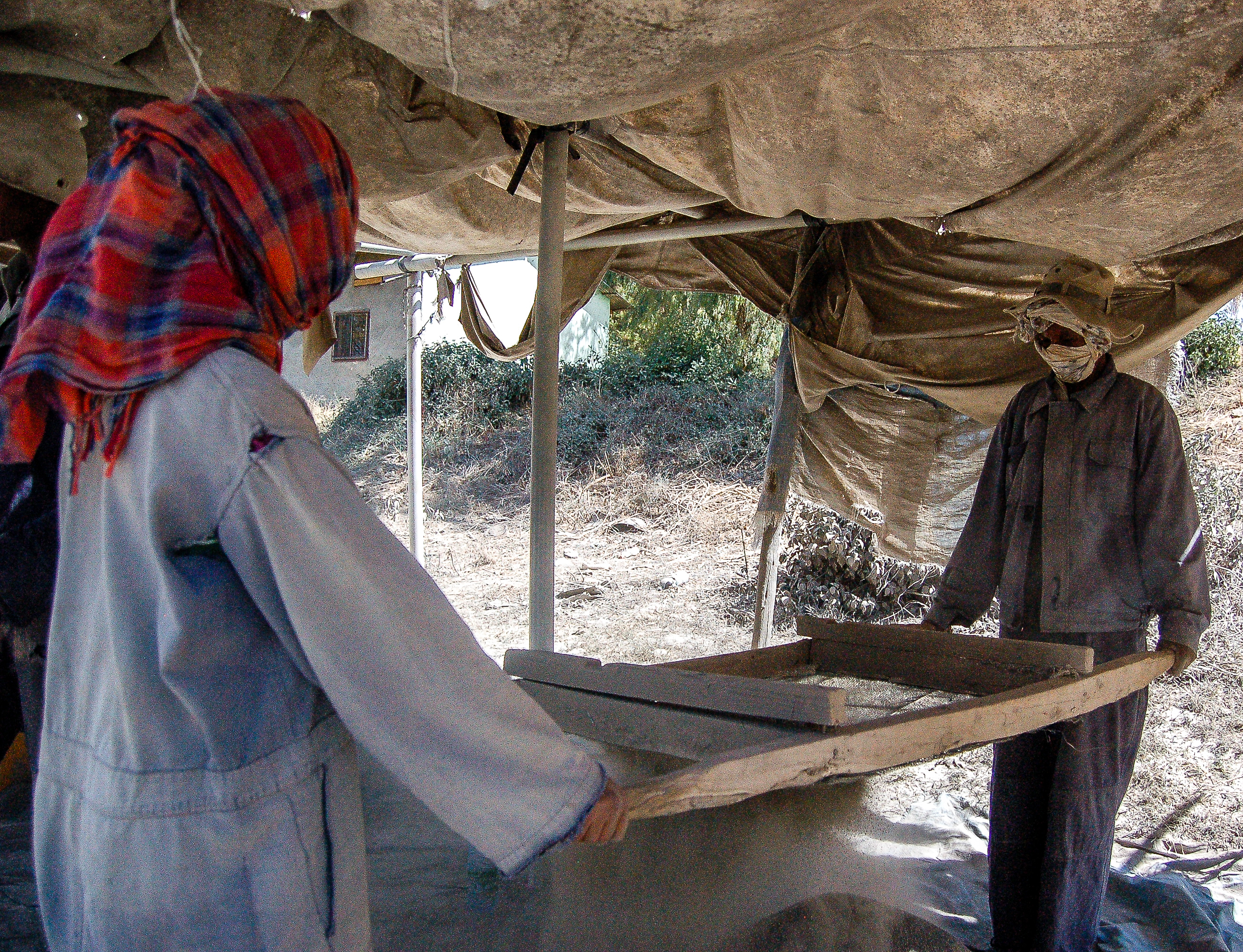 Earning a living-wage while sifting bio-sand medium for filters. 