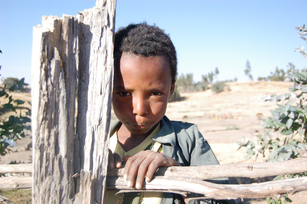 Boy at well